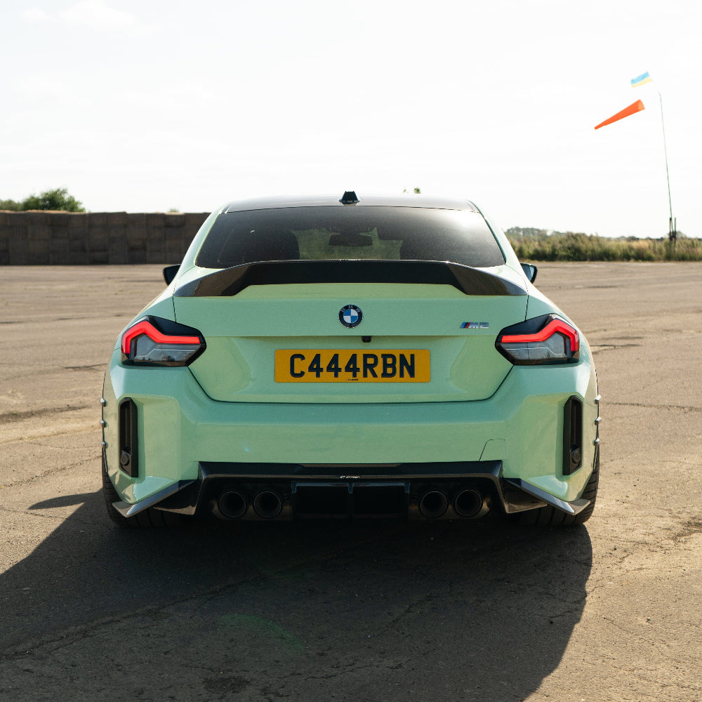 BMW G87 M2 full carbon fiber kit by CT Carbon, featuring sleek, lightweight carbon fiber panels on a sporty M2 vehicle.