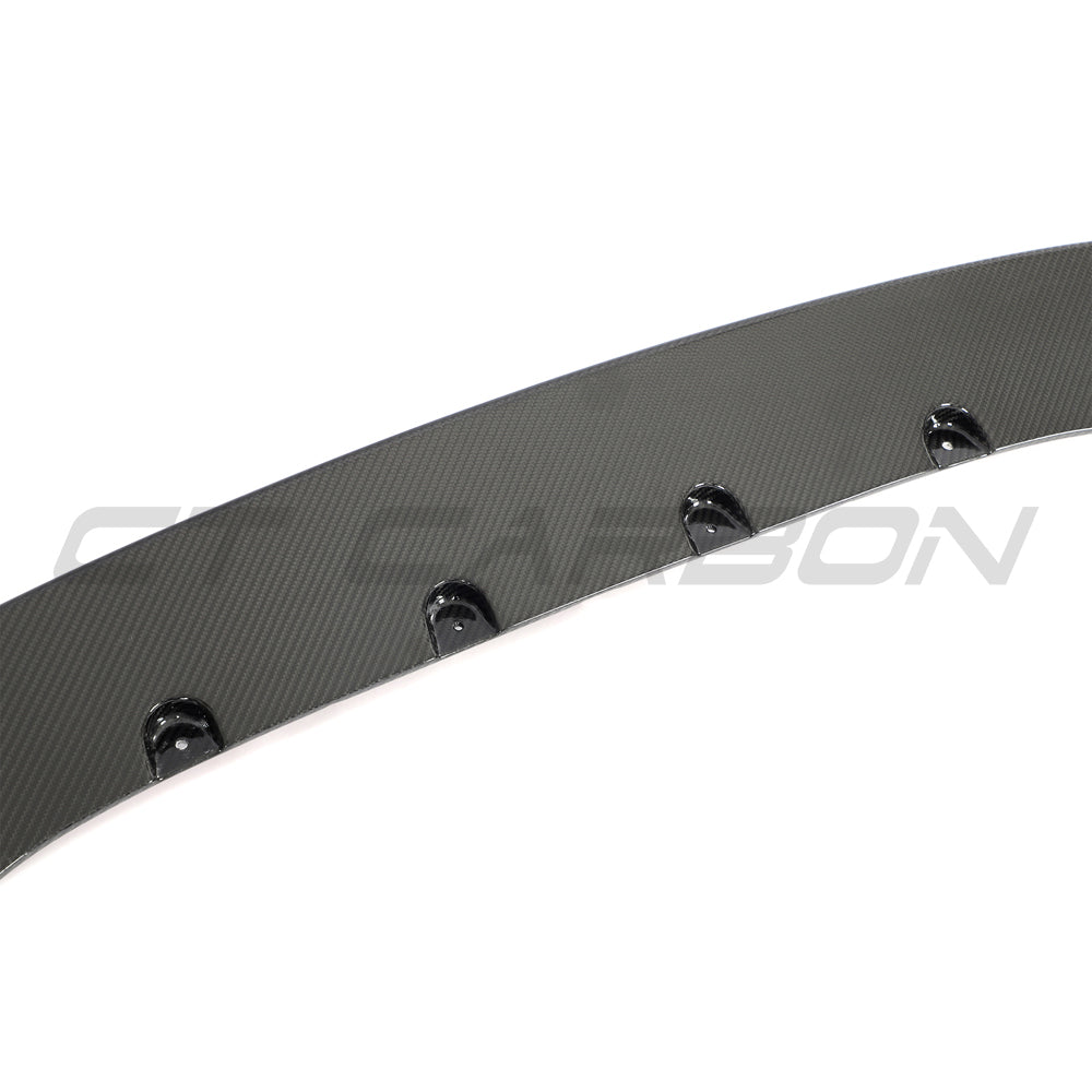BMW G87 M2 full carbon fibre kit by CT Carbon, showcasing sleek V6 design panels and aerodynamic enhancements.