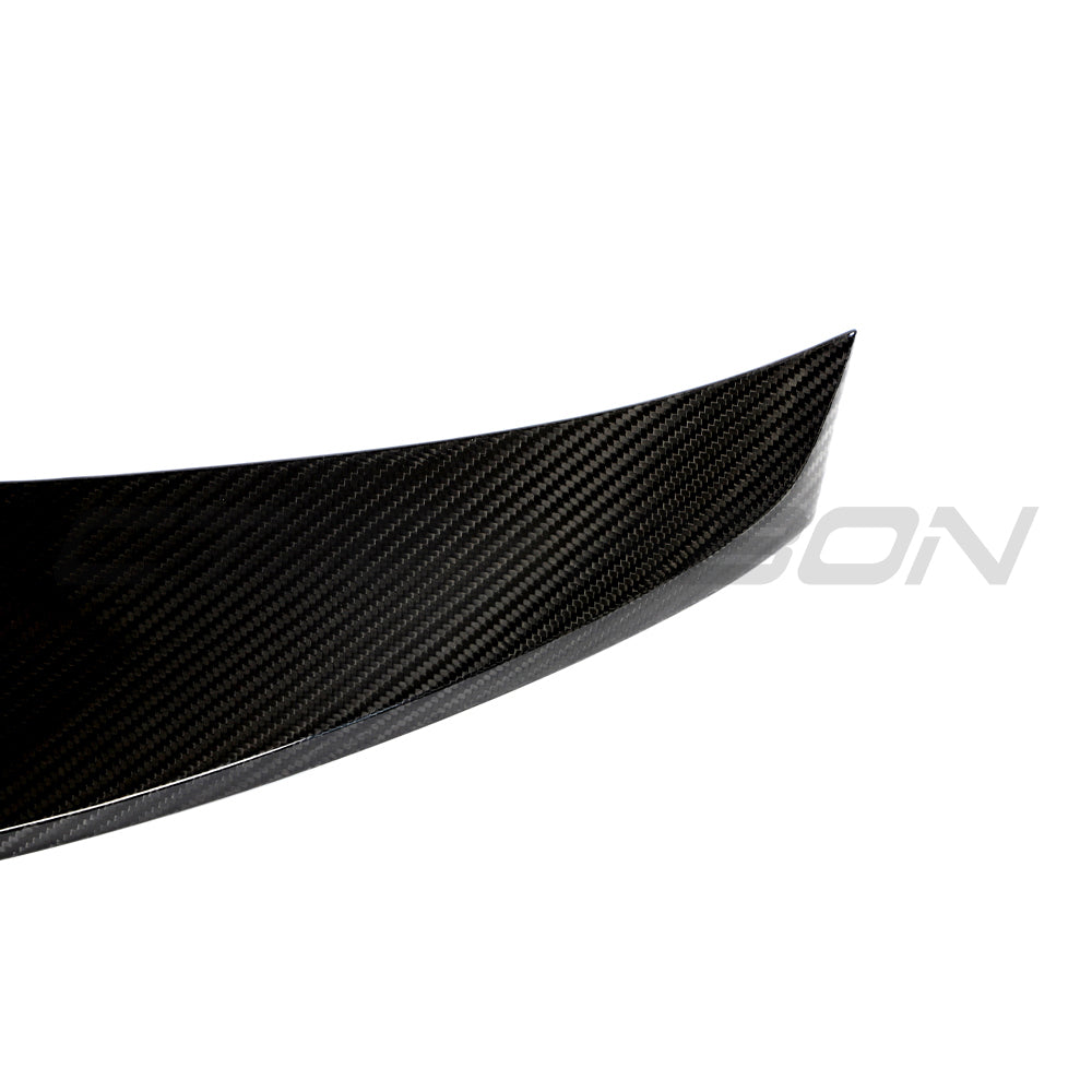 BMW G42 2 Series 2022+ full carbon fibre kit by CT Carbon, featuring a sleek carbon fibre spoiler on a sporty coupe.