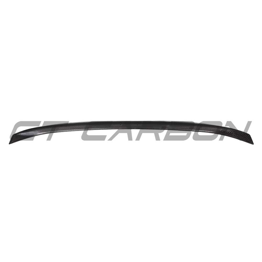 BMW G87 M2/G42 2 Series carbon fiber spoiler by CT Carbon, featuring a sleek MP-style design on a sporty car.