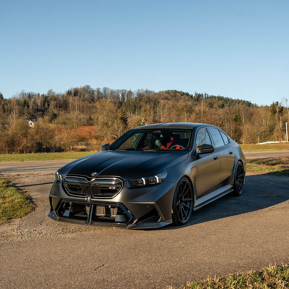 BMW G90 M5 and G99 M5 Touring 2024 carbon fibre splitter kit by CT Carbon, showcasing the sleek, lightweight front splitter design.