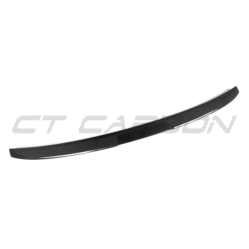 BMW G90 M5 and G60 5 Series 2023 carbon fibre spoiler by CT Carbon, showcasing sleek aerodynamic design and glossy finish.