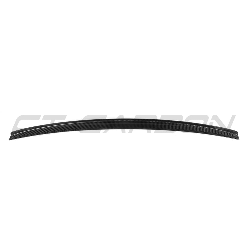 BMW G90 M5 and G60 5 Series 2023 carbon fibre spoiler by CT Carbon, showcasing sleek aerodynamic design on a sporty car.
