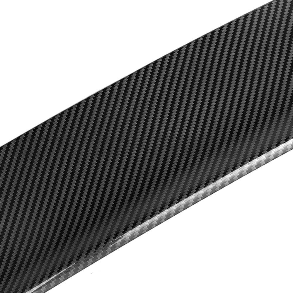 BMW G60 5 Series carbon fibre full car kit by CT Carbon, including spoiler, with close-up of glossy black carbon fibre components.