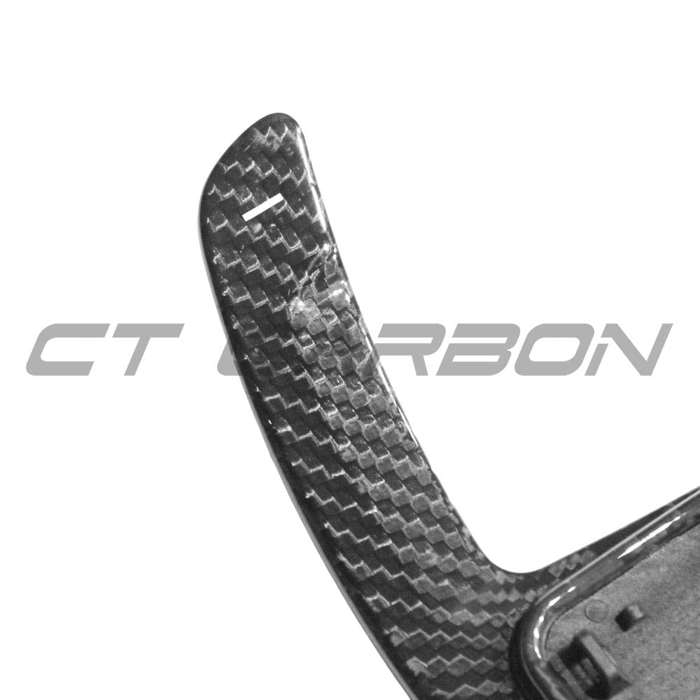 BMW GXX F40 Carbon Fibre Shifter Paddles by CT Carbon, close-up of sleek, lightweight carbon fiber paddles for BMW interior accessories.