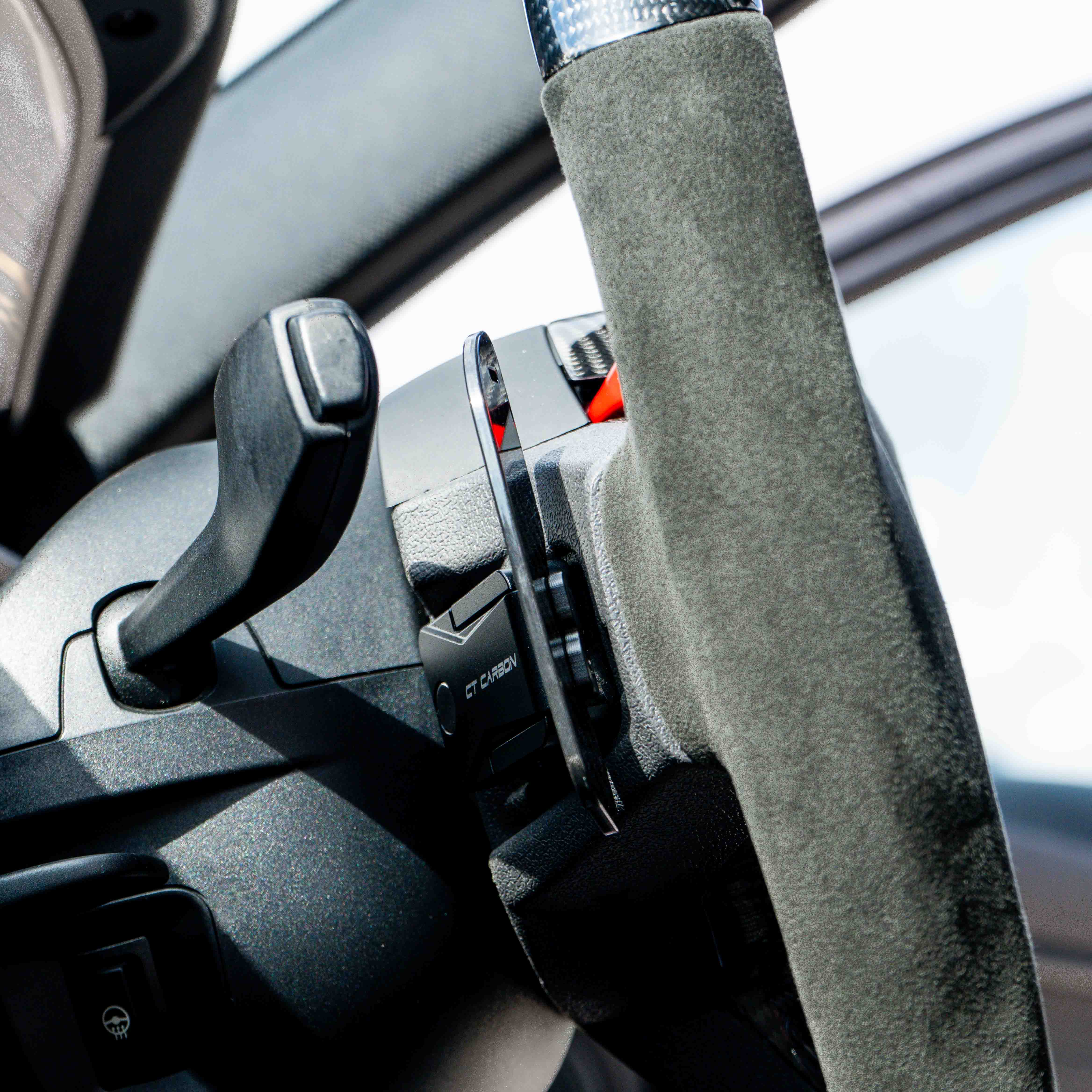 BMW Gxx Carbon Fibre Magnetic Shifter Paddles by CT Carbon, close-up of sleek, lightweight carbon fibre paddles on steering wheel