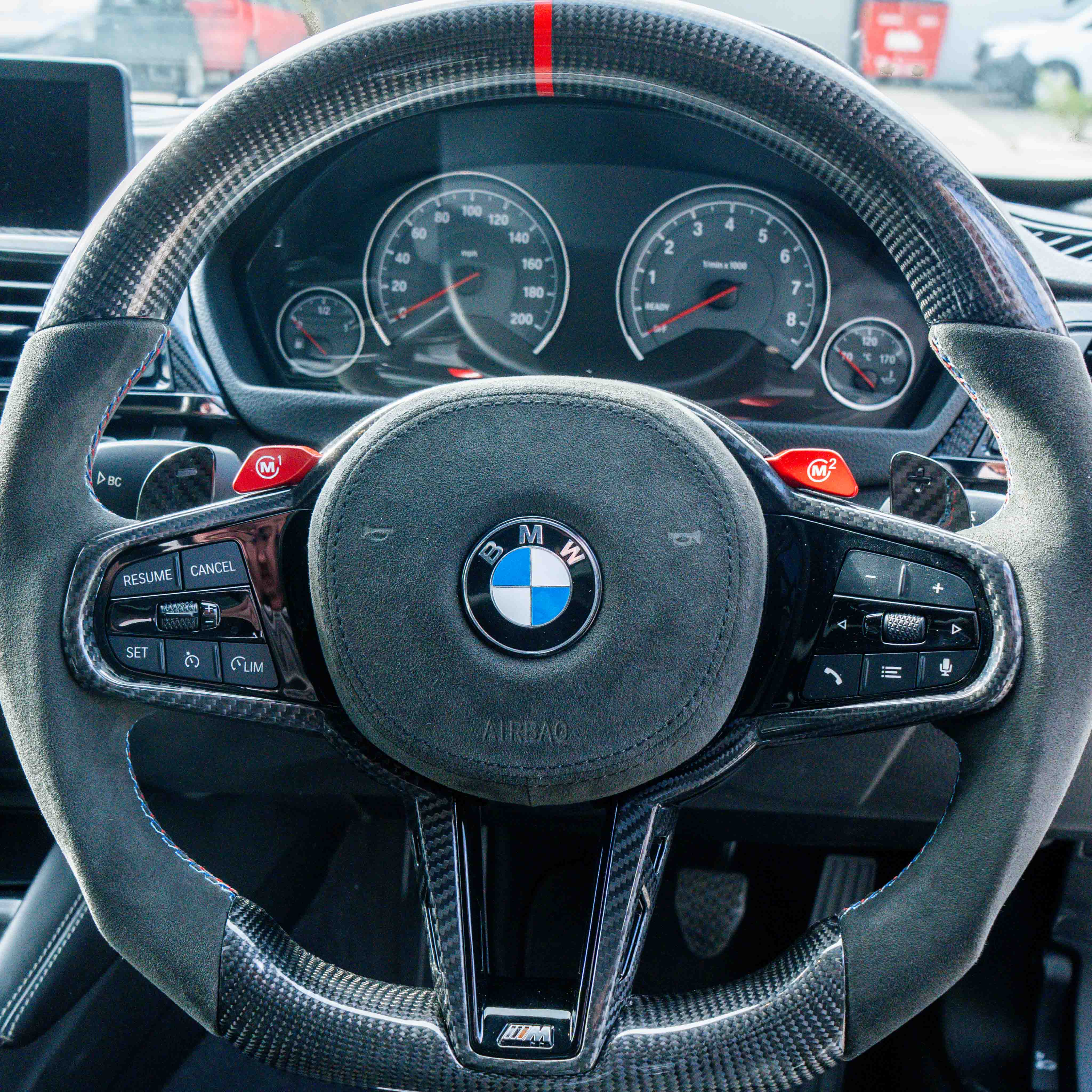 BMW Gxx carbon fibre magnetic shifter paddles by CT Carbon, showing sleek, lightweight design for enhanced driving control.