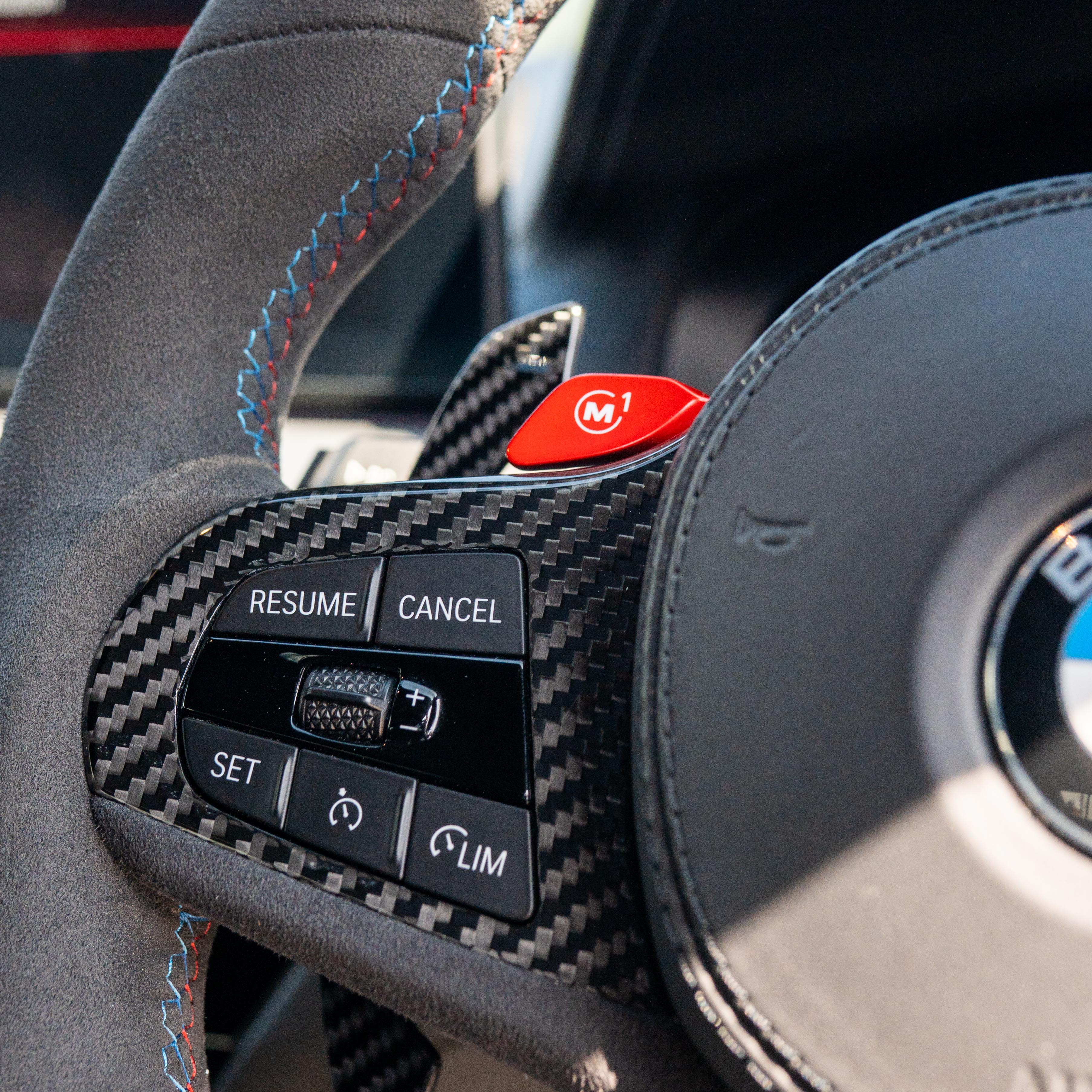 BMW Gxx carbon fibre magnetic shifter paddles by CT Carbon, sleek racing-style accessories for enhanced driving experience.