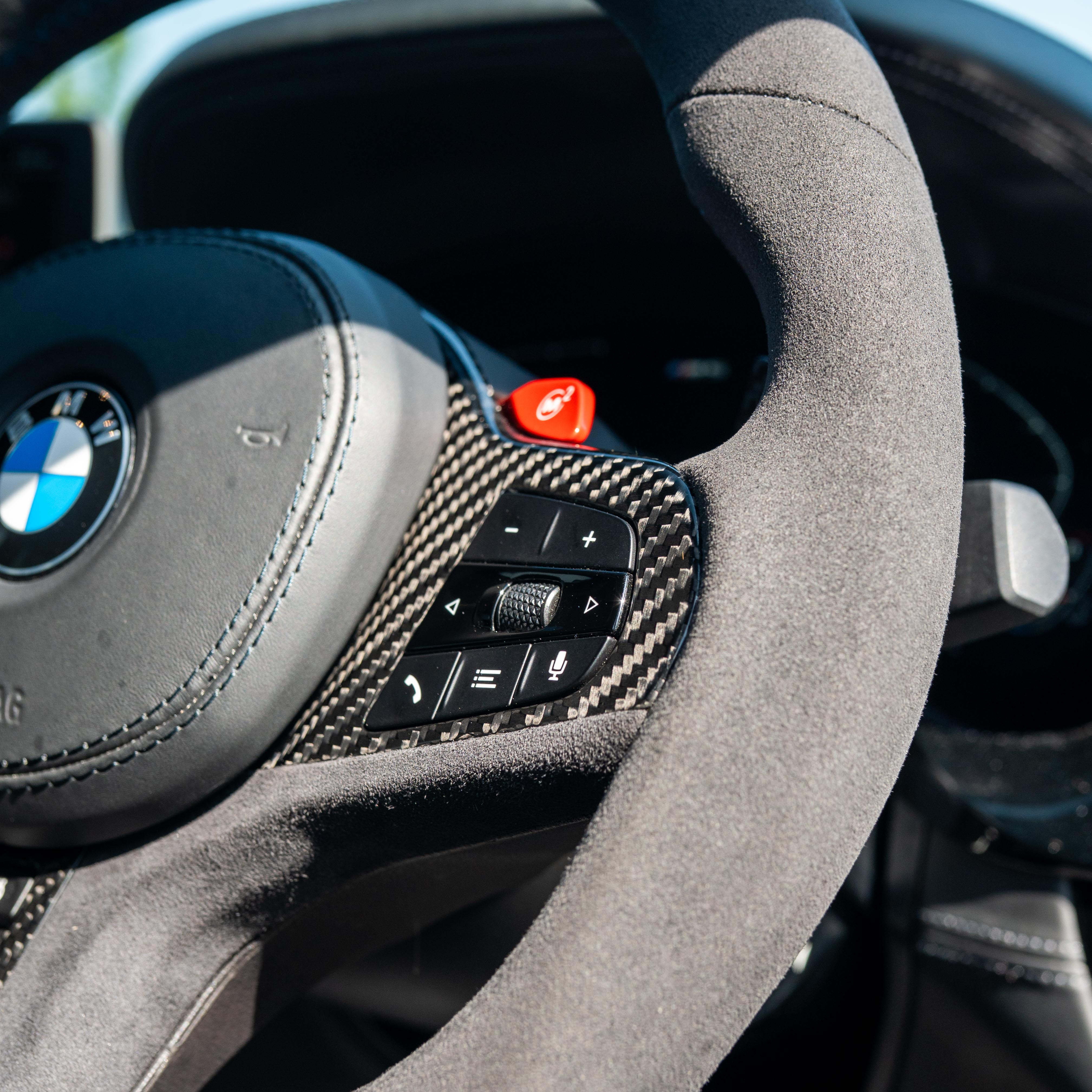 BMW Gxx carbon fibre magnetic shifter paddles by CT Carbon, featuring a sleek design for sporty driving.