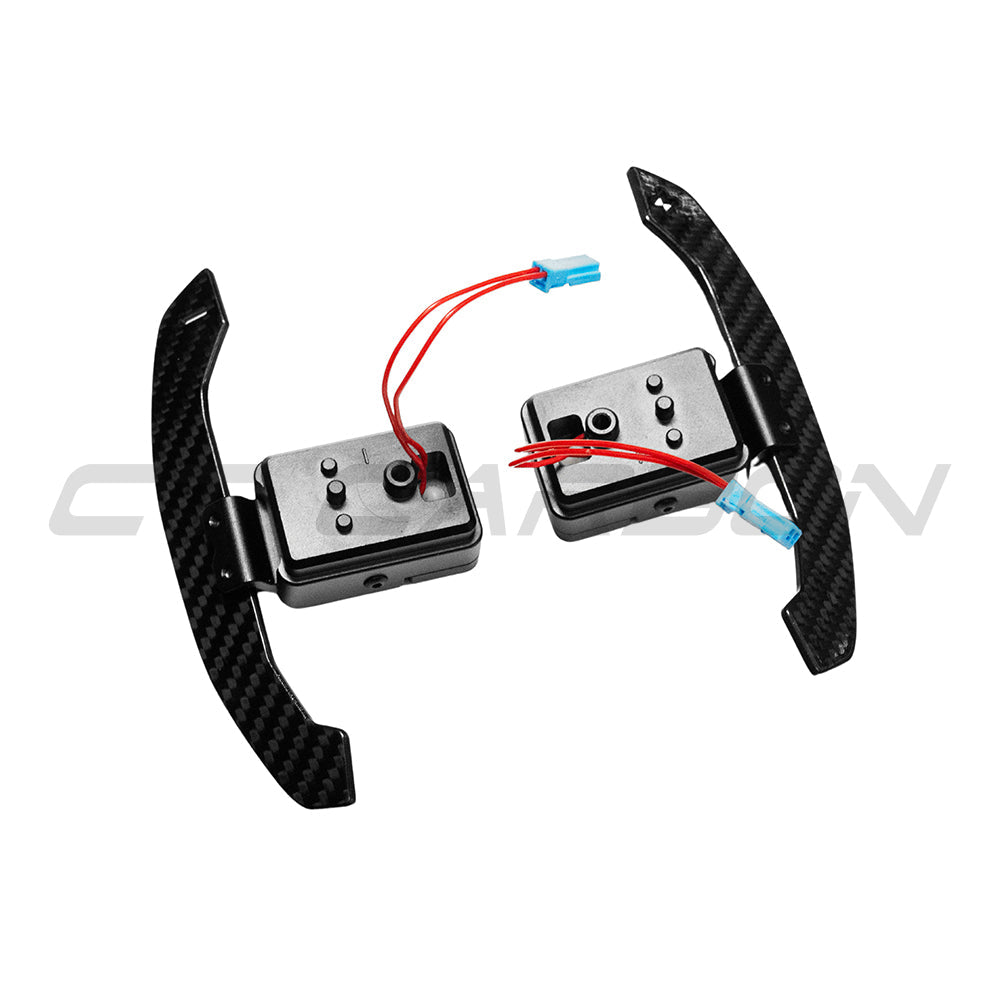 BMW Gxx carbon fibre magnetic shifter paddles by CT Carbon, showing sleek, lightweight racing-style paddle accessories for vehicles.