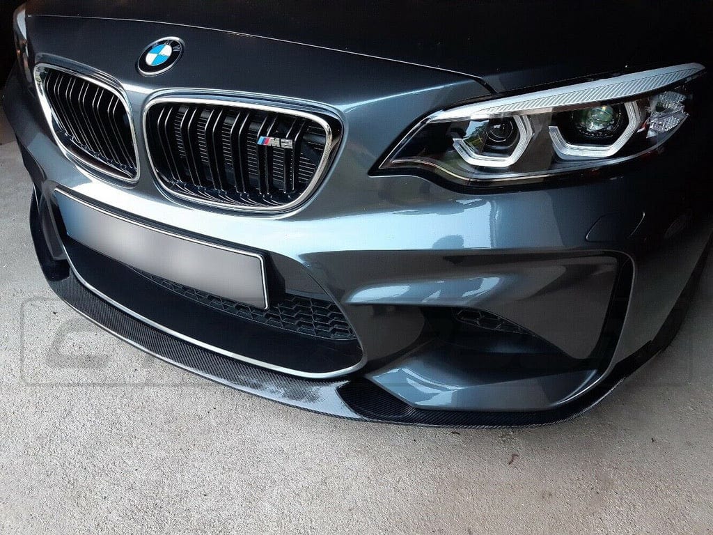 BMW M2 F87 N55 CT Carbon OG carbon fibre splitter, V4, showcasing sleek aerodynamic design on the front of the car.