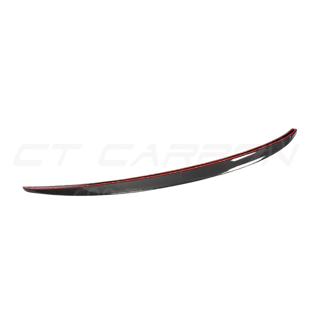 BMW M2 F87 OG full carbon fibre kit by CT Carbon, featuring V2 MP style components on a sleek car.