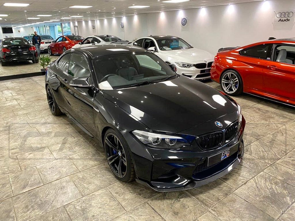 BMW M2 F87 OG full carbon fibre kit by CT Carbon, featuring V2 MP style body parts on a sleek car.