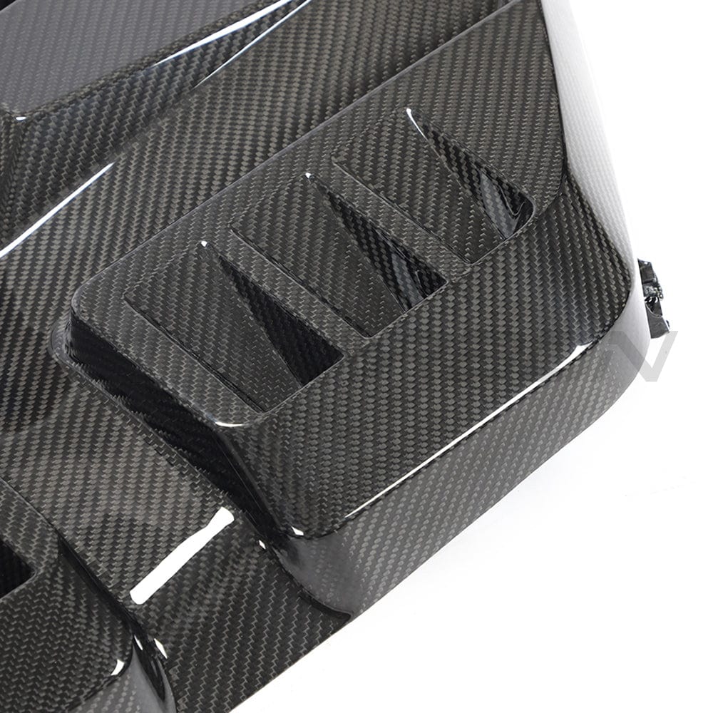 BMW M2, M3, M4 G87/G80/G81/G82/G83 carbon fibre engine cover by CT Carbon, showcasing sleek, lightweight automotive accessories.