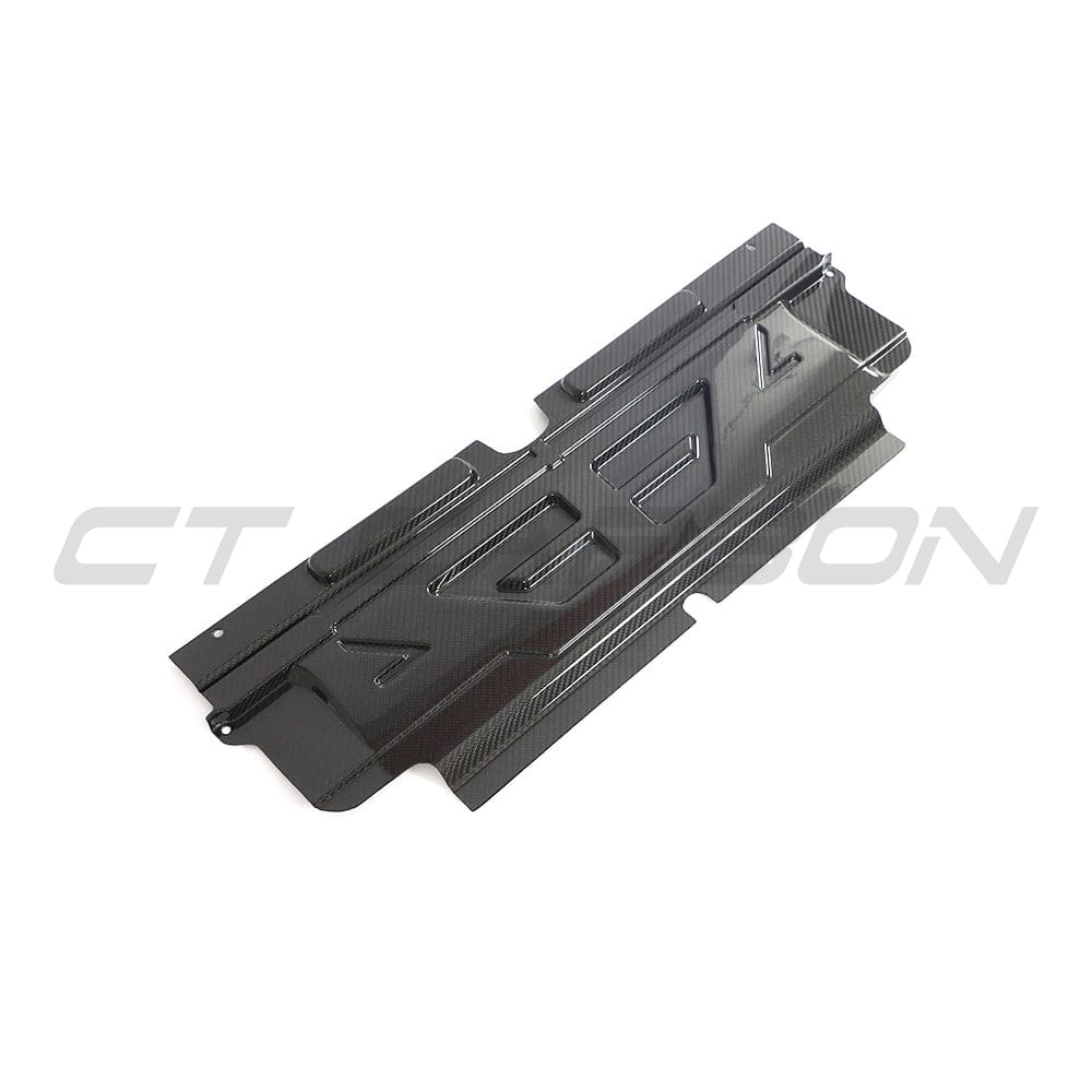 BMW M2, M3, M4 G87/G80/G81/G82/G83 carbon fiber engine dress-up kit by CT Carbon, showing sleek carbon fiber accents on engine components.