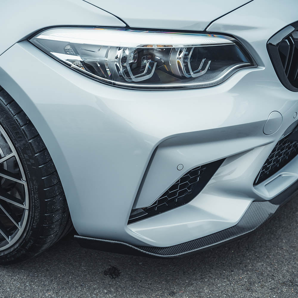 BMW M2C F87 carbon fibre splitter by CT Carbon, V4 CS style, showcasing the lightweight aerodynamic front splitter.
