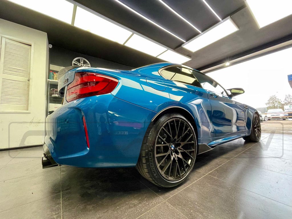 BMW M2C F87 full carbon fibre kit by CT Carbon, featuring MP style components on a sleek, modern vehicle.