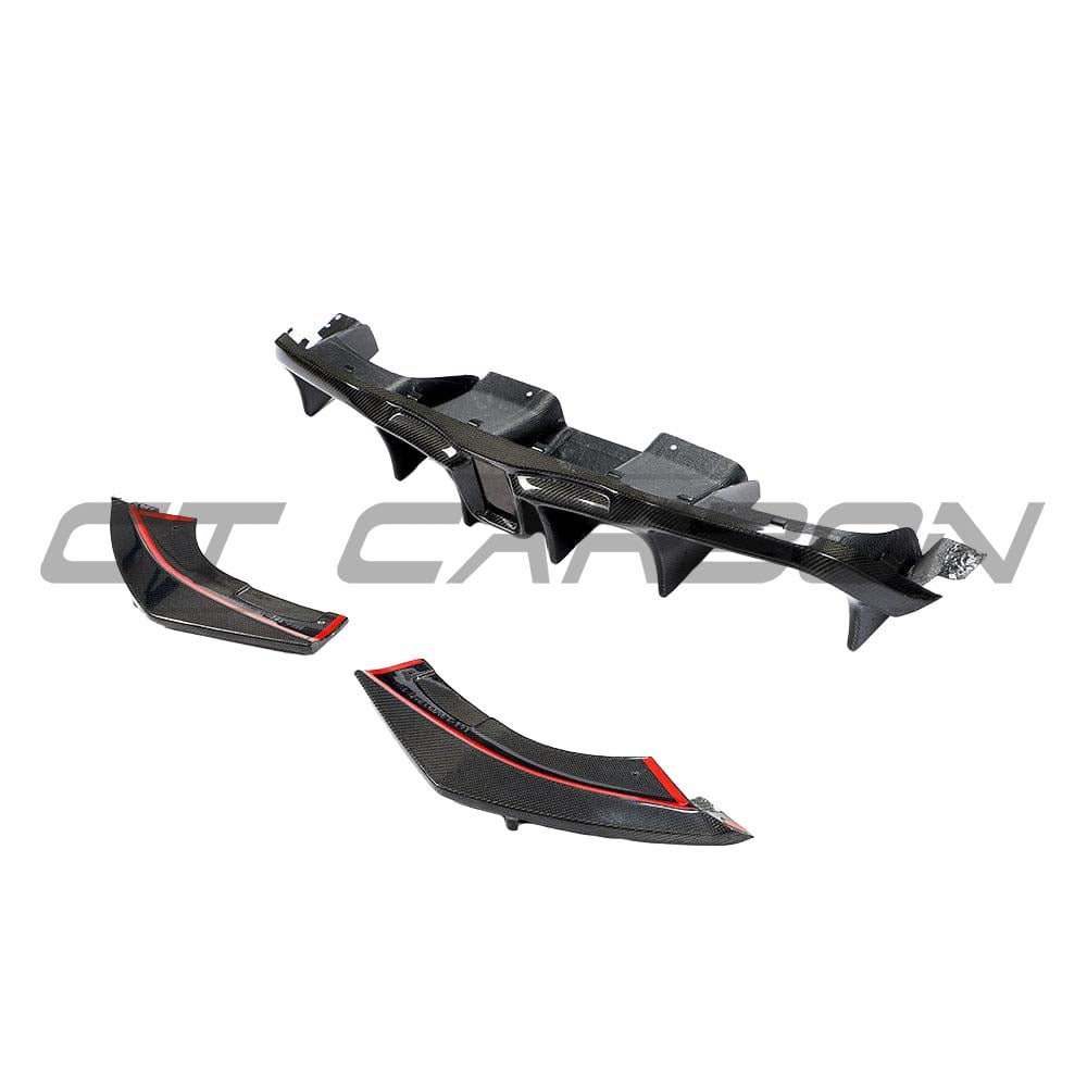 BMW F87 M2 2016-2018 CT Carbon full carbon fibre diffuser kit, showcasing an aggressive design on the car's rear.