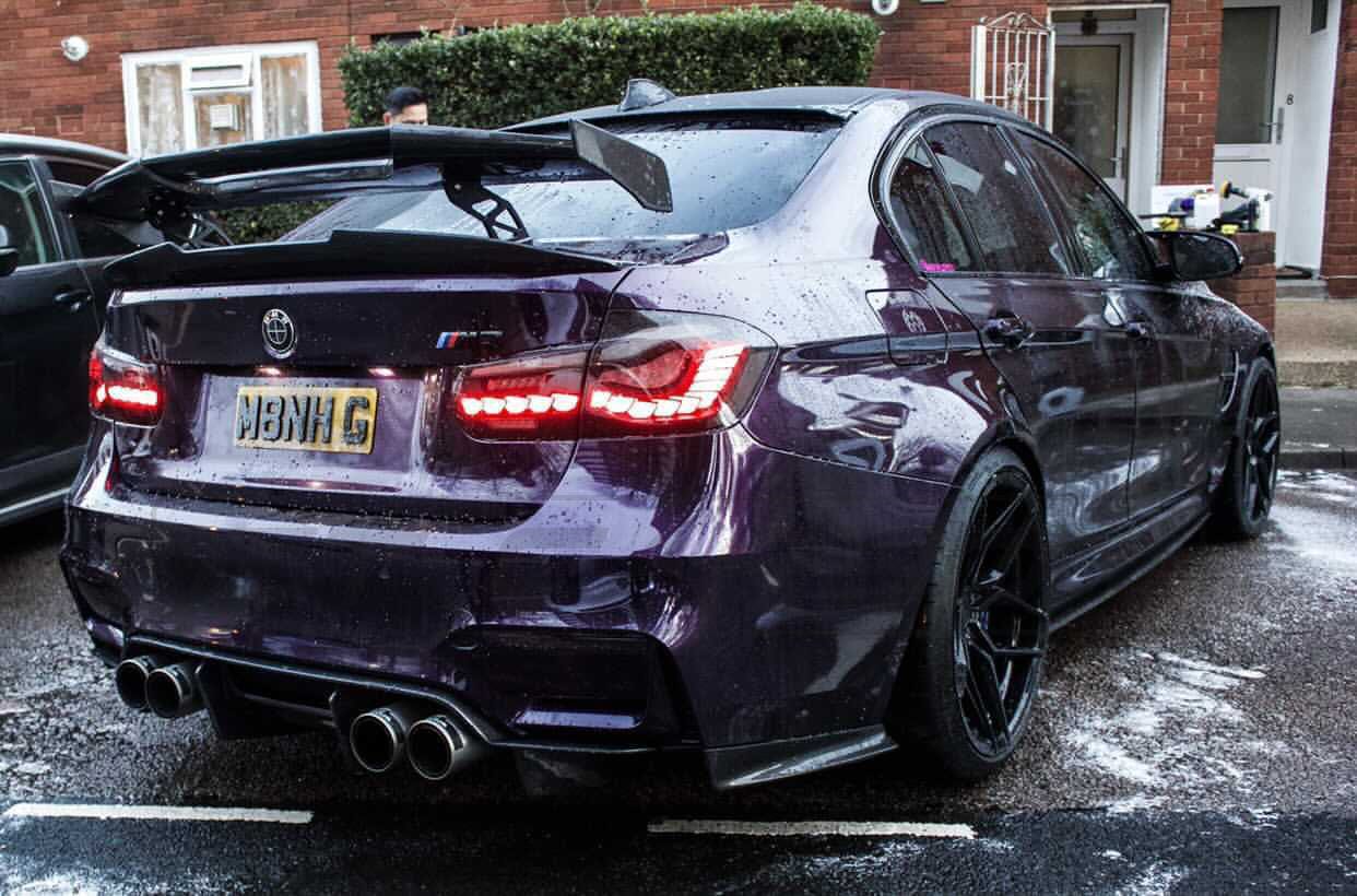 BMW M2 M3 M4 carbon fibre wing spoiler by CT Carbon, V2 style, showcasing the sleek, lightweight aerodynamic design.