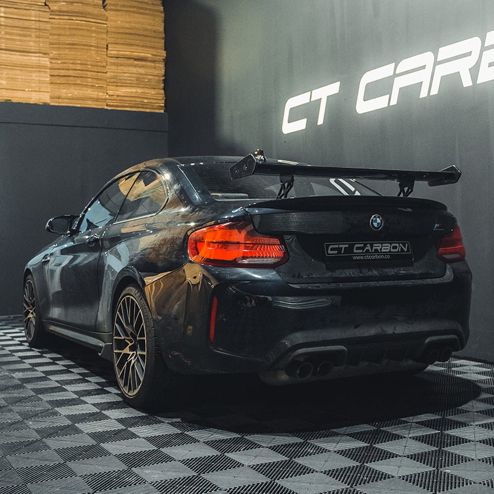 BMW M2/M3/M4 F80/F82/F87 CT Carbon fiber spoiler in GTS style, showcasing its sleek carbon fiber construction and aerodynamic design.
