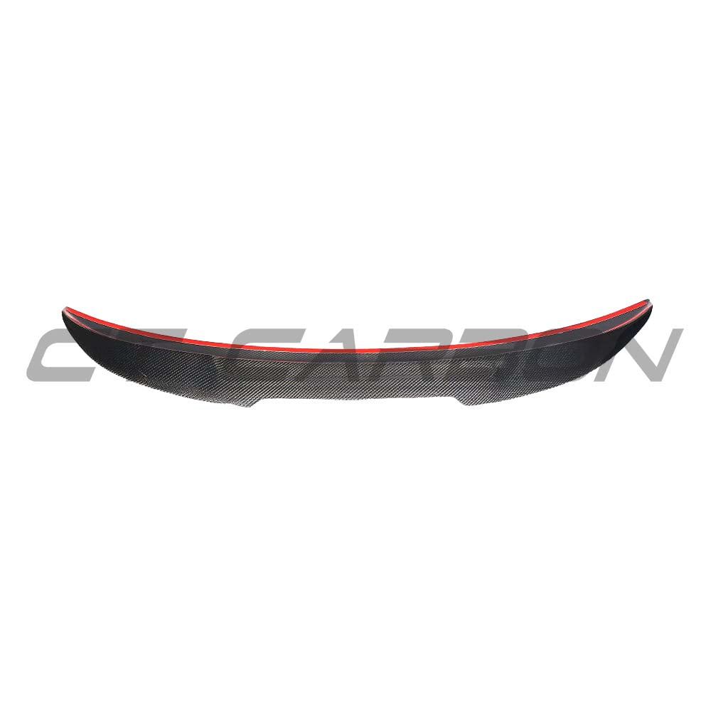 BMW M3 and 3 Series E90 carbon fibre spoiler by CT Carbon, showcasing a sleek, aerodynamic design on a silver sedan.