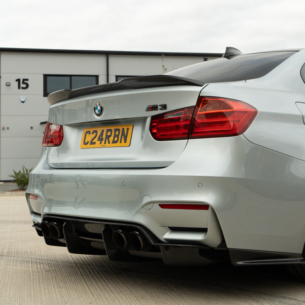 BMW M3 M4 F80 F82 F83 carbon fibre diffuser by CT Carbon, showcasing its sleek design and lightweight carbon fiber material.