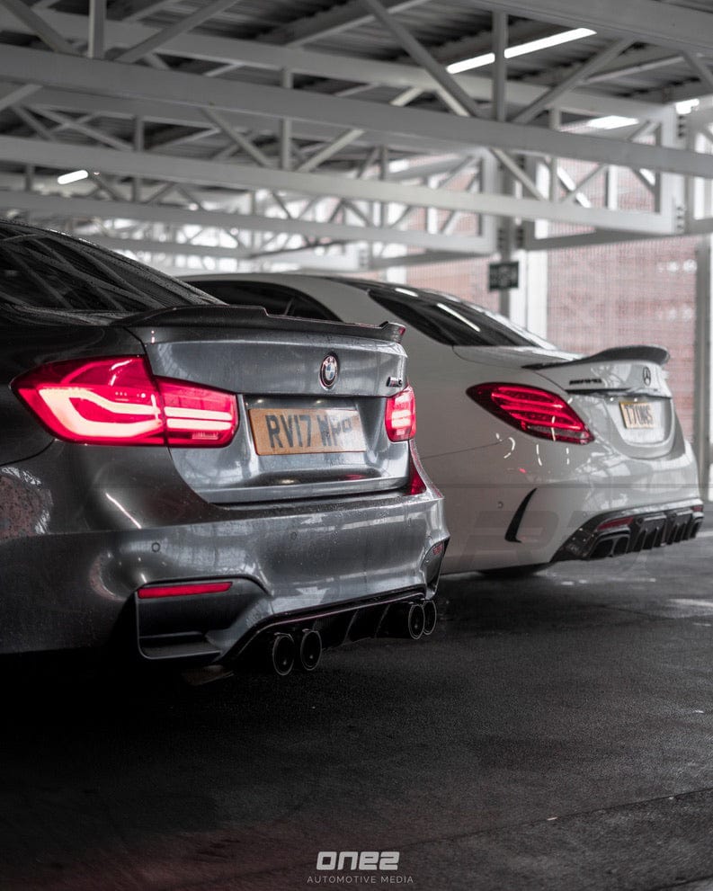 BMW M3 F80 full carbon fiber kit by CT Carbon, featuring CS-style components on a sleek black car.