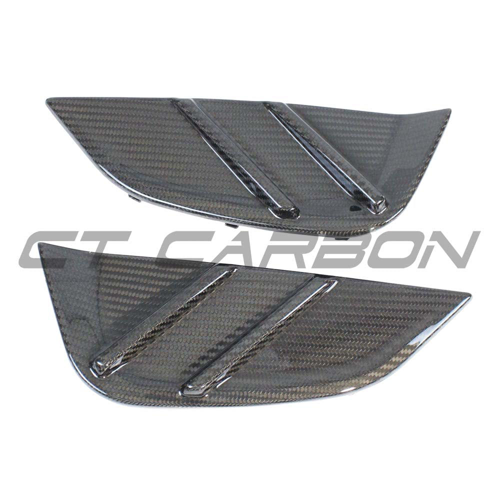 BMW M3 G80 G81 carbon fibre replacement side fender trim by CT Carbon, showing sleek, lightweight accessory for vehicle enhancement.