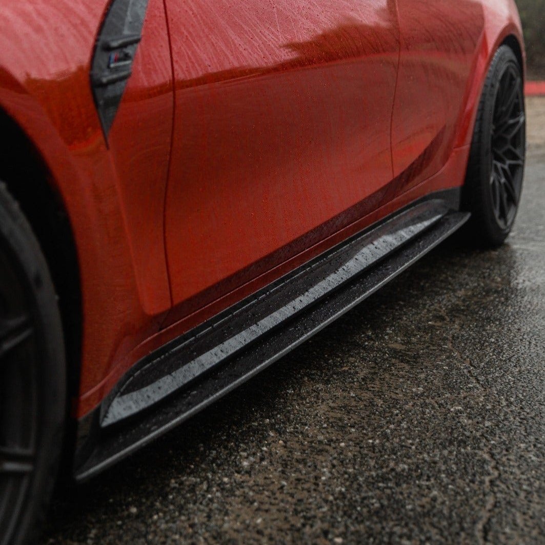 BMW M3 G80 G81 carbon fibre side skirt replacement by CT Carbon, showcasing sleek, lightweight automotive side skirt design.