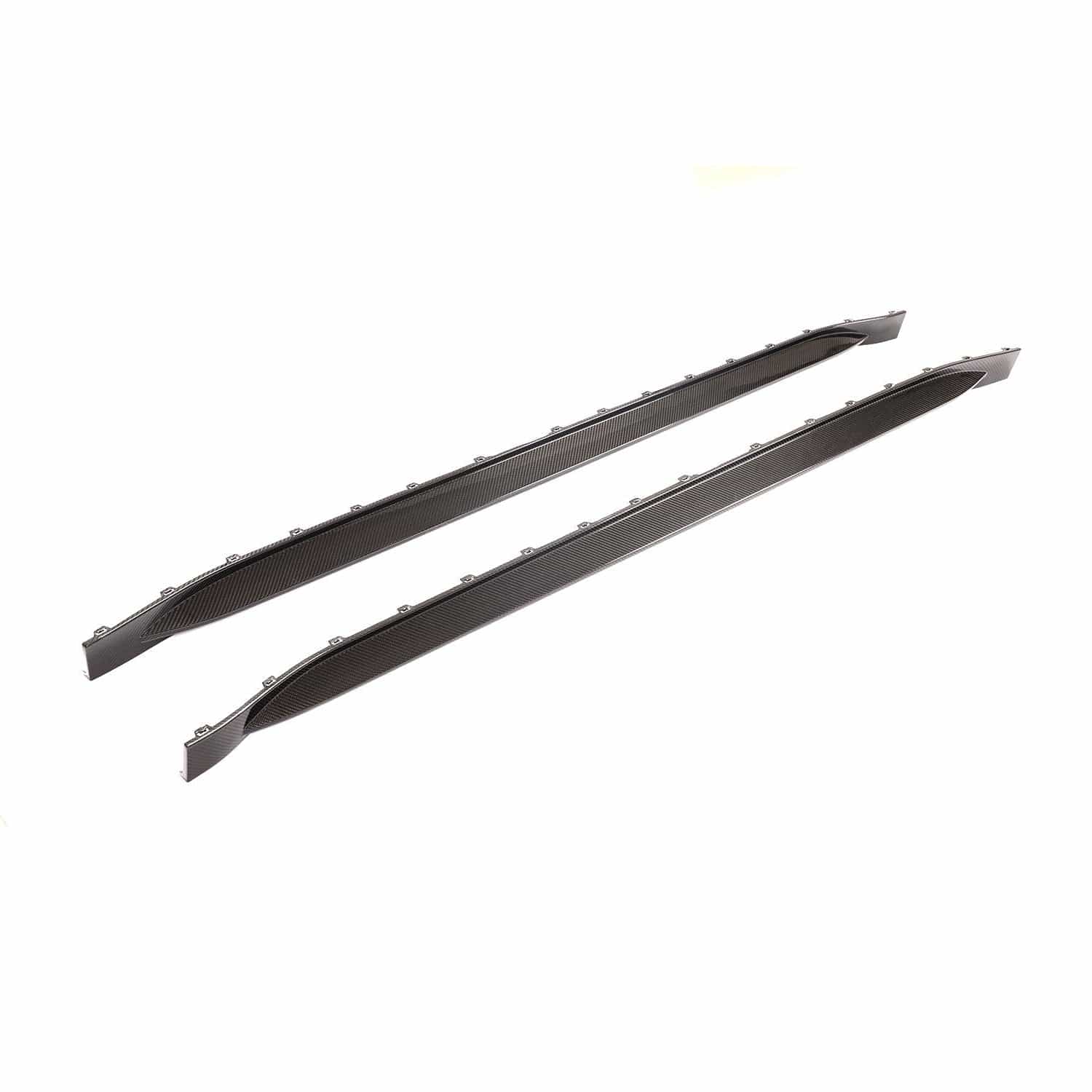 BMW M3 G80 G81 carbon fibre side skirt replacement by CT Carbon, showcasing sleek, lightweight car body enhancement.