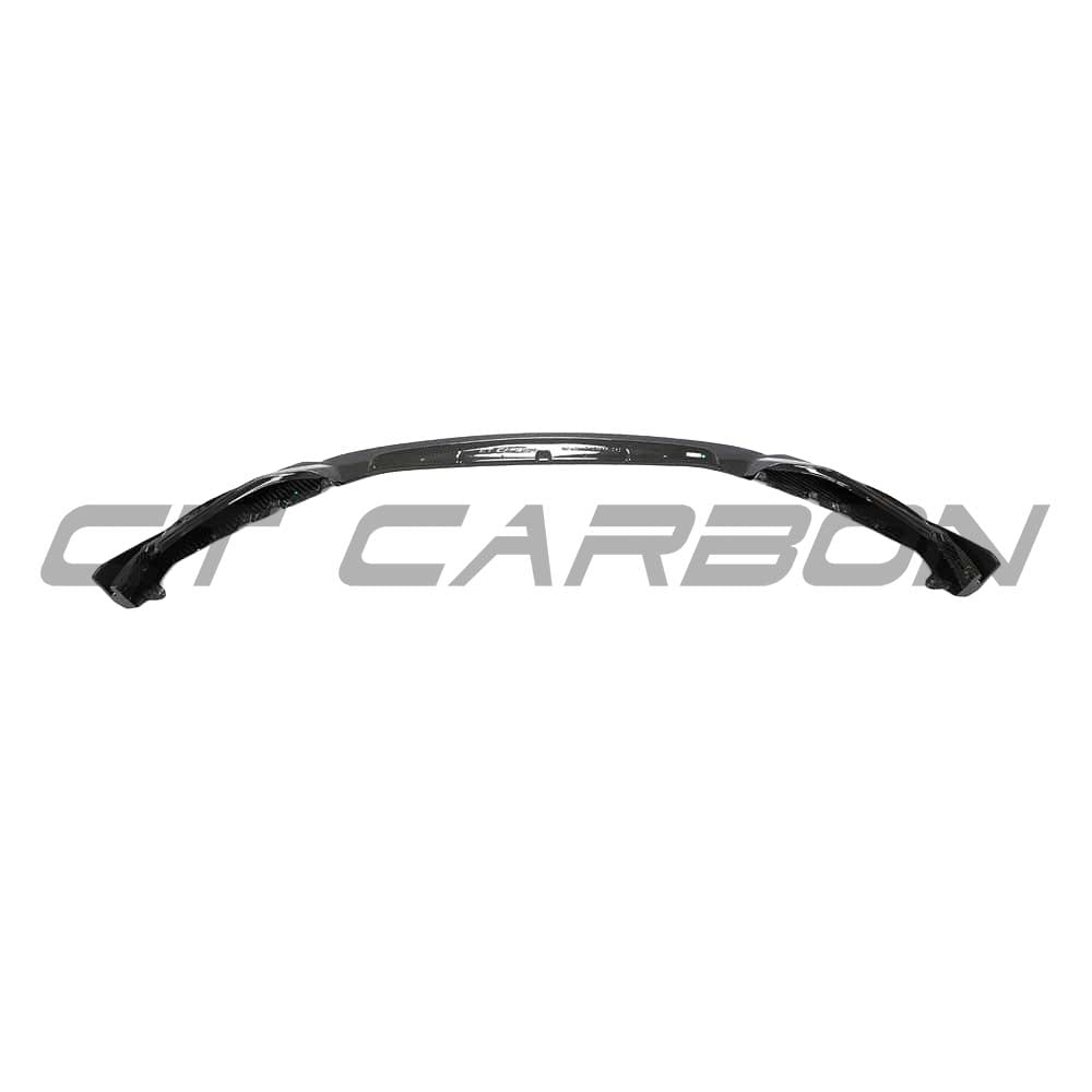 BMW M3 M4 G80 G82 G83 carbon fibre front end pack by CT Carbon, featuring a sleek carbon fibre splitter on a sports car.