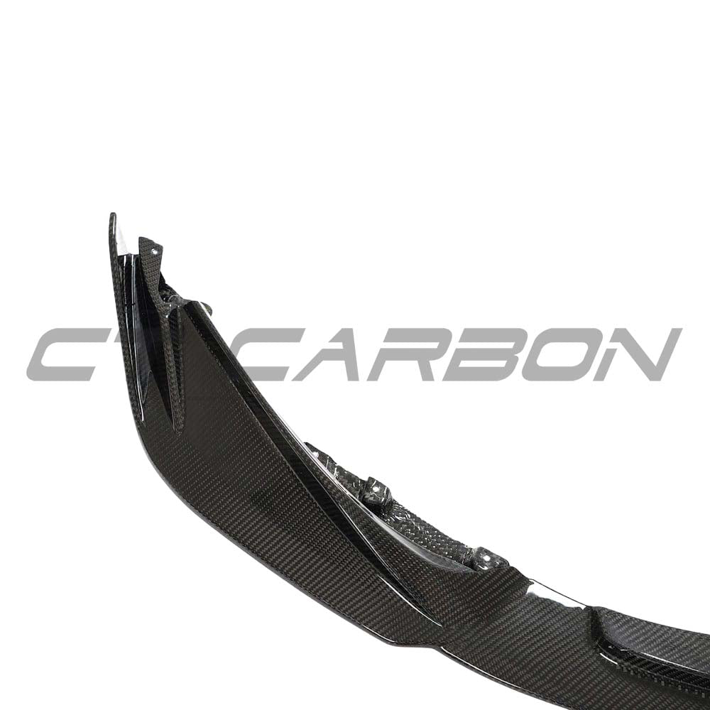 BMW M3 M4 G80 G82 carbon fibre front end pack by CT Carbon, featuring a sleek splitter and aerodynamic design.