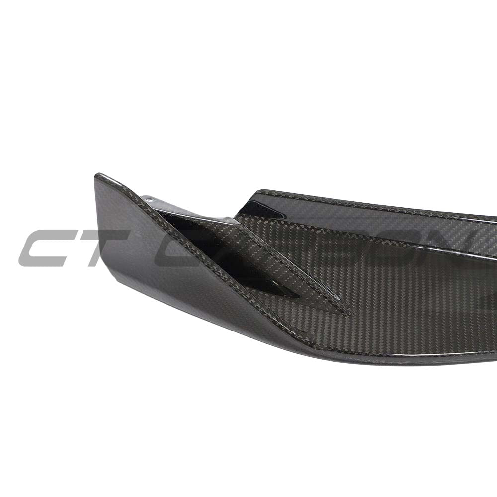 BMW M3 M4 G80 G82 G83 carbon fiber front end pack by CT Carbon, featuring a sleek splitter and aerodynamic enhancements.
