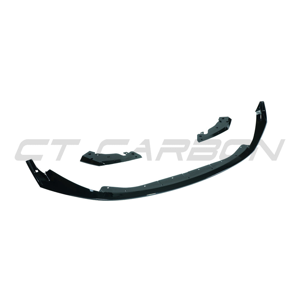 BMW M3 M4 G80 G81 G82 G83 gloss black splitter by CT Carbon, showcasing its sleek, aerodynamic design and CSL style finish.
