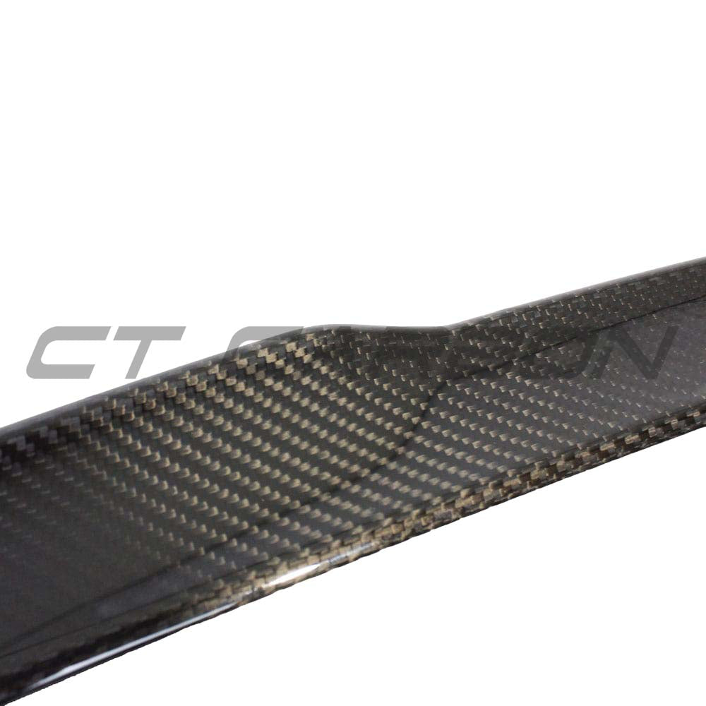 BMW M3 G80 G20 carbon fiber spoiler by CT Carbon, sporty MP-style spoiler with sleek carbon fiber finish on car.