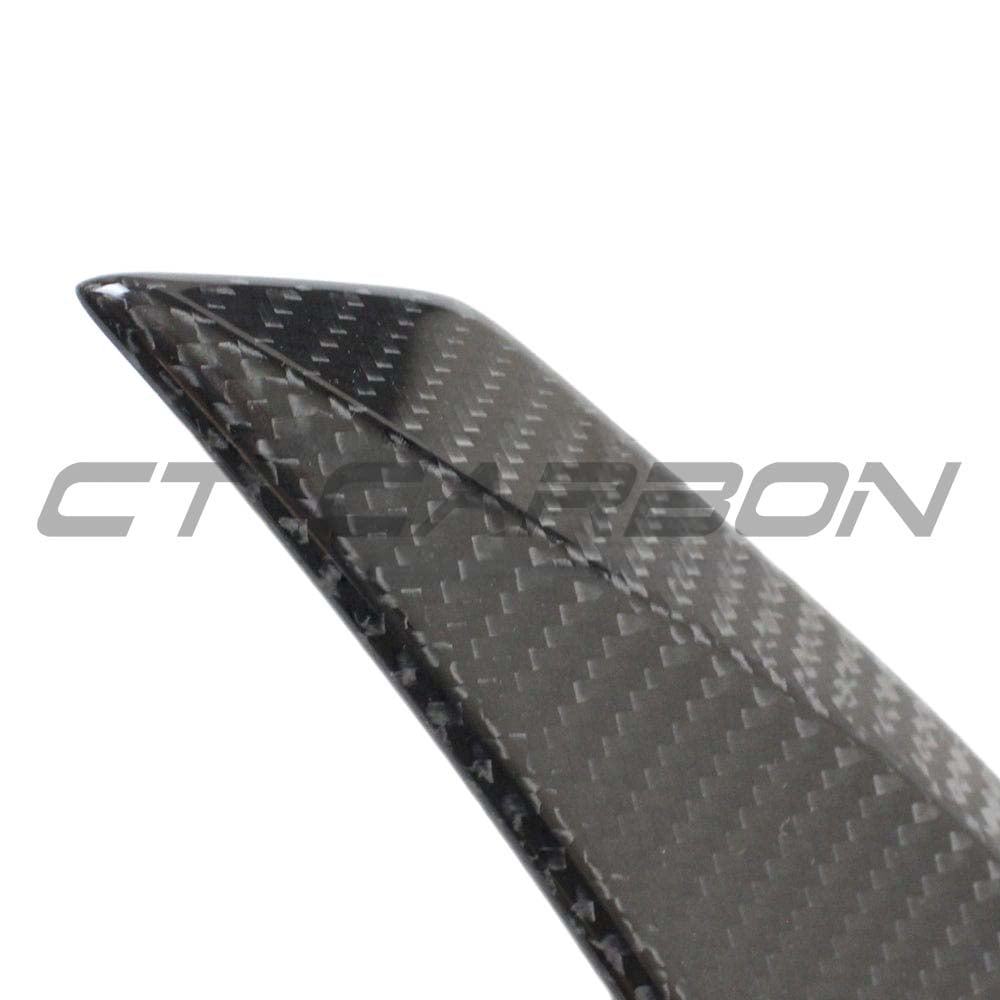 BMW M4 G82 G22 carbon fiber spoiler by CT Carbon, V4 style, showing sleek, aerodynamic design on a sporty vehicle.