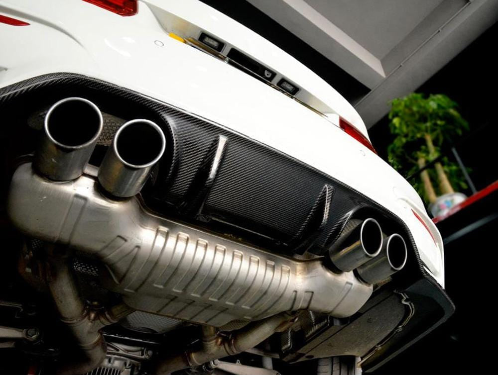 BMW M3 M4 F80 F82 F83 carbon fiber diffuser by CT Carbon, showcasing a sleek 3D style design for improved aerodynamics.