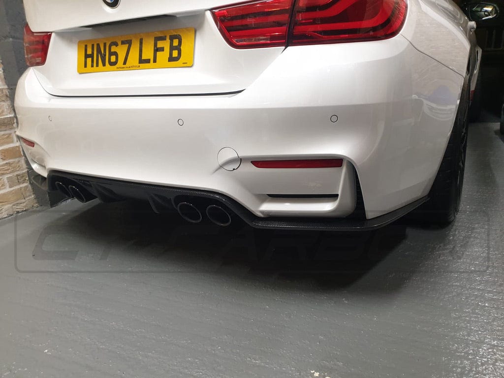 BMW M3 M4 F80 F82 F83 carbon fibre diffuser by CT Carbon, showcasing a sleek 3D style aerodynamic rear diffuser.