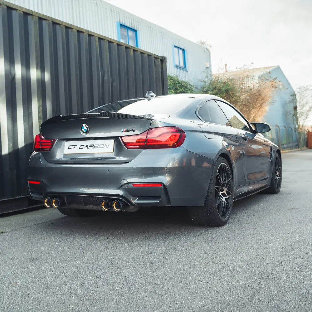 BMW M3 M4 F80 F82 F83 carbon fibre diffuser by CT Carbon, showcasing sleek, high-performance automotive diffuser design.