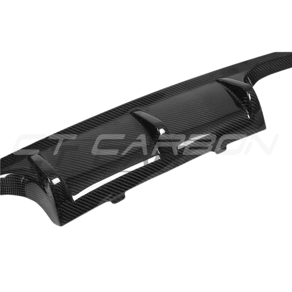 BMW M3 M4 F80 F82 F83 carbon fiber diffuser by CT Carbon, V1 style, showcasing sleek aerodynamic design.