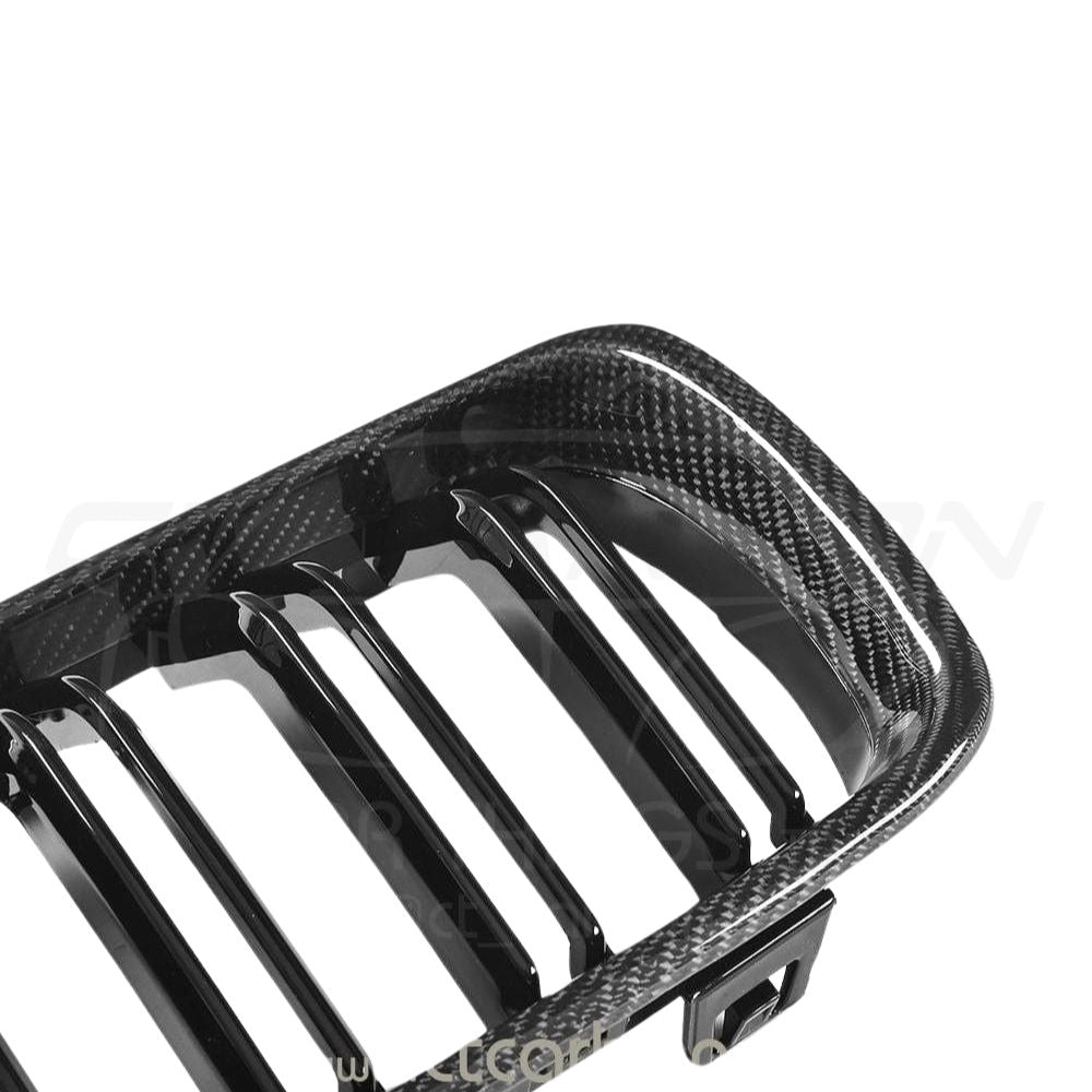 BMW M3 M4 F80 F82 F83 carbon fibre front grille by CT Carbon, showcasing sleek, lightweight design and textured carbon fiber surface.