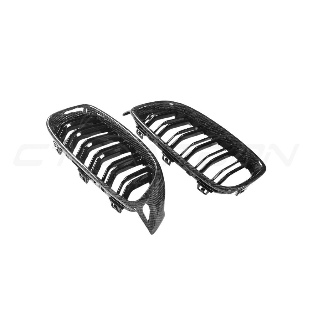 BMW M3 M4 F80 F82 F83 carbon fibre front grille by CT Carbon, showing the sleek, textured carbon fibre design and grille details.