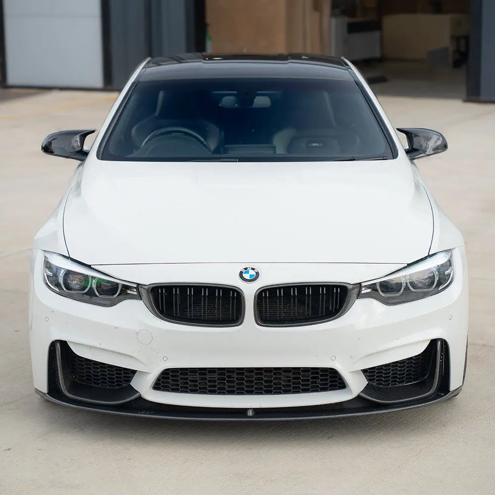 BMW M3 M4 F80 F82 F83 carbon fiber front grille by CT Carbon, showcasing sleek, lightweight design and detailed weave pattern.