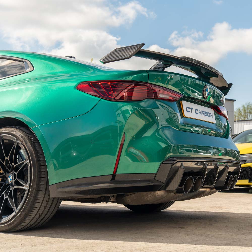 BMW G80 M3 & G82 M4 Carbon Fibre Wing Spoiler by CT Carbon, front view showing sleek aerodynamic design.