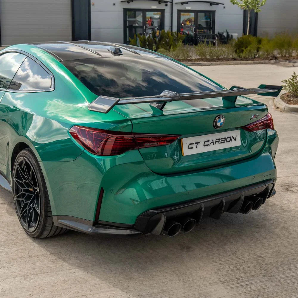BMW G80 M3 and G82 M4 carbon fibre wing spoiler by CT Carbon, showcasing the sleek, aerodynamic design for high-performance vehicles.