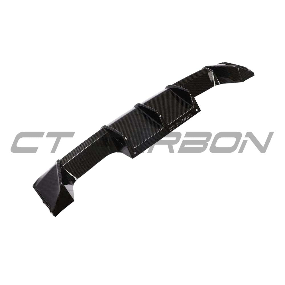 BMW M3 M4 G80 G82 G83 carbon fibre diffuser by CT Carbon, showing the sleek V2 design with textured carbon fiber finish.