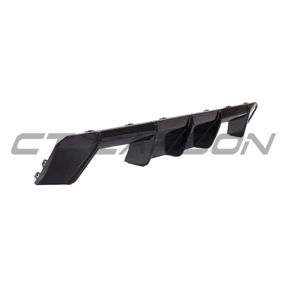 BMW M3 M4 G80 G82 G83 carbon fiber diffuser by CT Carbon, V2 style, showcasing its sleek aerodynamic design.