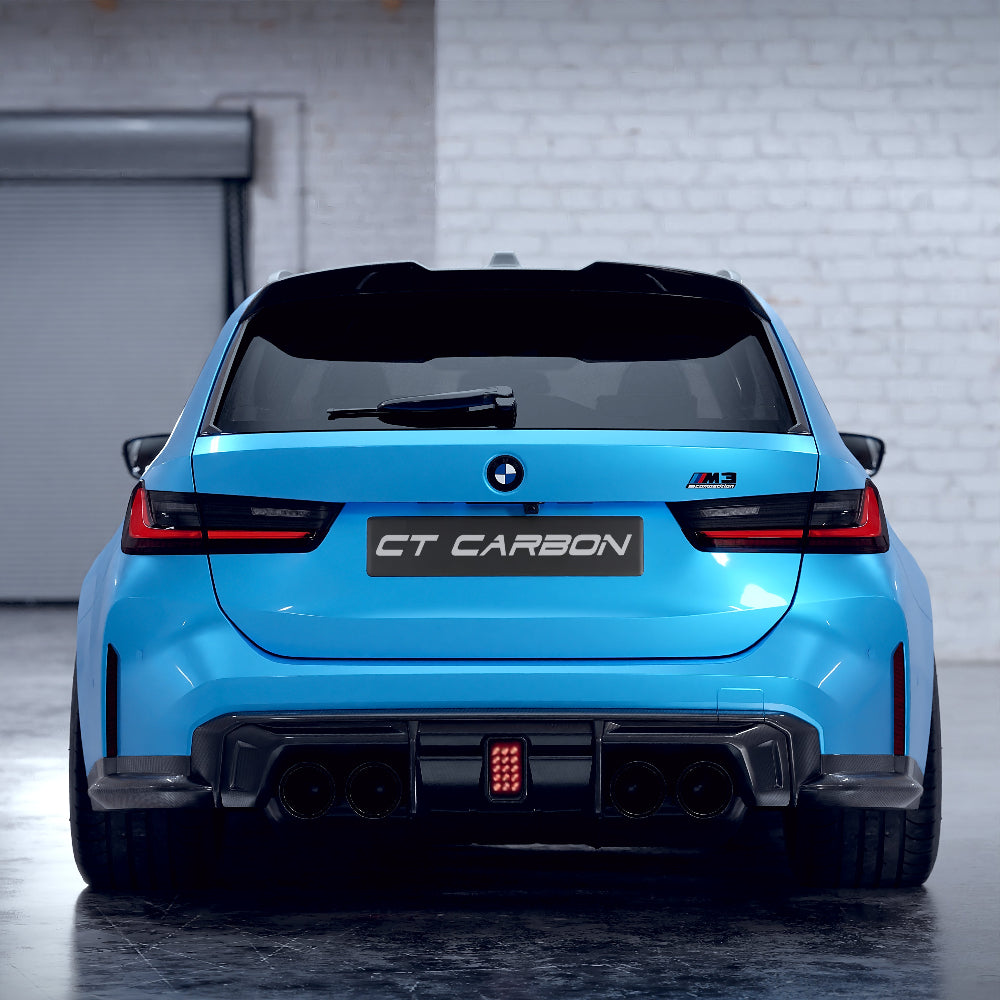 BMW M3 M4 G80 G81 G82 G83 carbon fiber diffuser with integrated LED lights, designed by CT Carbon for sporty performance.