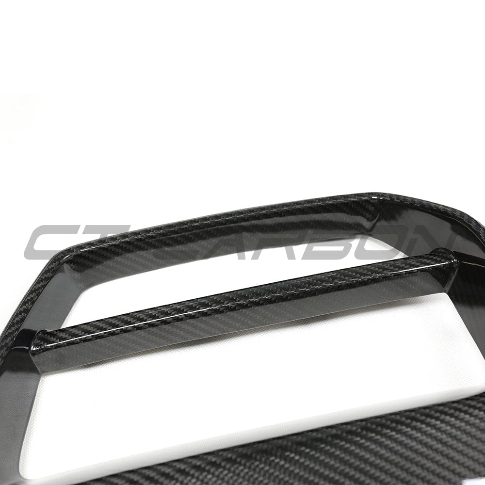 BMW M3 M4 G80 G82 carbon fibre front end pack by CT Carbon, featuring a sleek grille design without accessories.