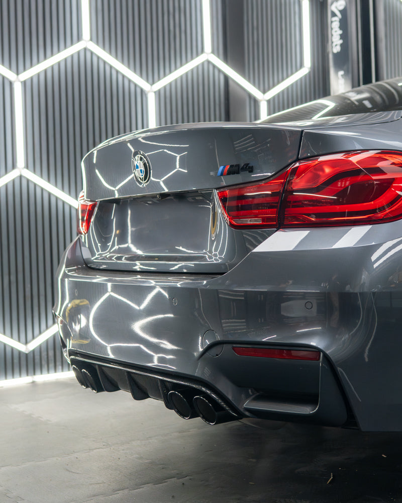 BMW F82 M4 coupe 2014-2020 full carbon fibre kit by CT Carbon, including front splitter, side skirts, and rear diffuser.